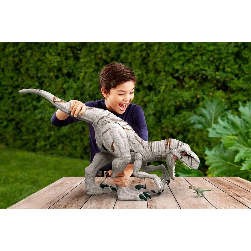 Boneco Dinossauro Jurassic World Atrociraptor - Colossal Gigante 93cm + 20  mini dinossauros